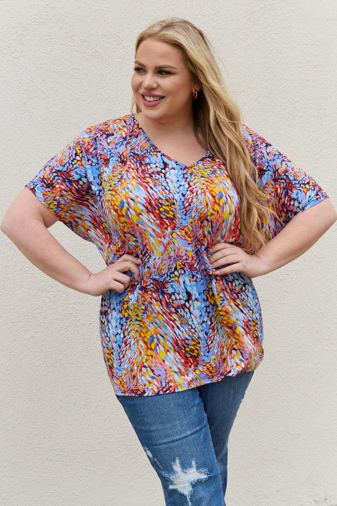 Be Stage Full Size Printed Dolman Flowy Top (Online Only) - Made by Trendsi , available in Be Stage, blouse, colorful, curvy, exclusive, June, online, Plus size, Ship from USA, short sleeves, Tops , located in Panama City, FL.