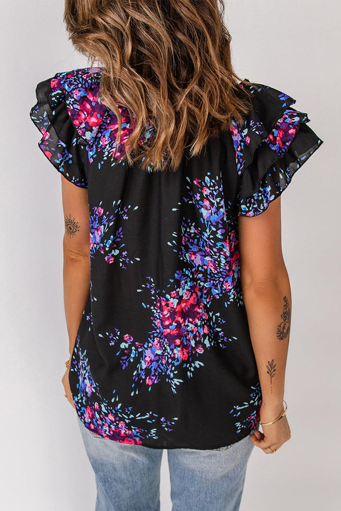 Floral Tie-Neck Flutter Sleeve Blouse (Online Only) - Made by Trendsi , available in black, bright, floral, pink, purple , located in Panama City, FL.